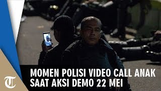 Viral Momen Anggota Polisi Video Call dengan Anak di Sela-sela Demo Massa 22 Mei di Bawaslu