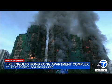At least 13 dead as massive fire engulfs Hong Kong high-rises