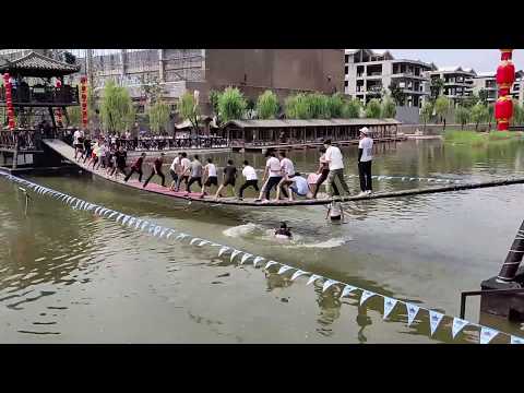 Dancing on the swing bridge? ALL IN THE WATER   
