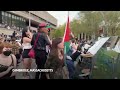 Pro-Palestinian protesters knock down barrier at MIT - Video