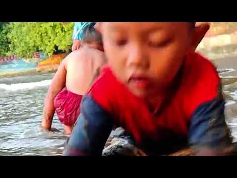 “Simple Beach Joy: Gibran Playing with His Sister at Sunset”