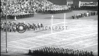 Midshipmen march and a navy band plays during the opening ceremony of the Army Na...HD Stock Footage