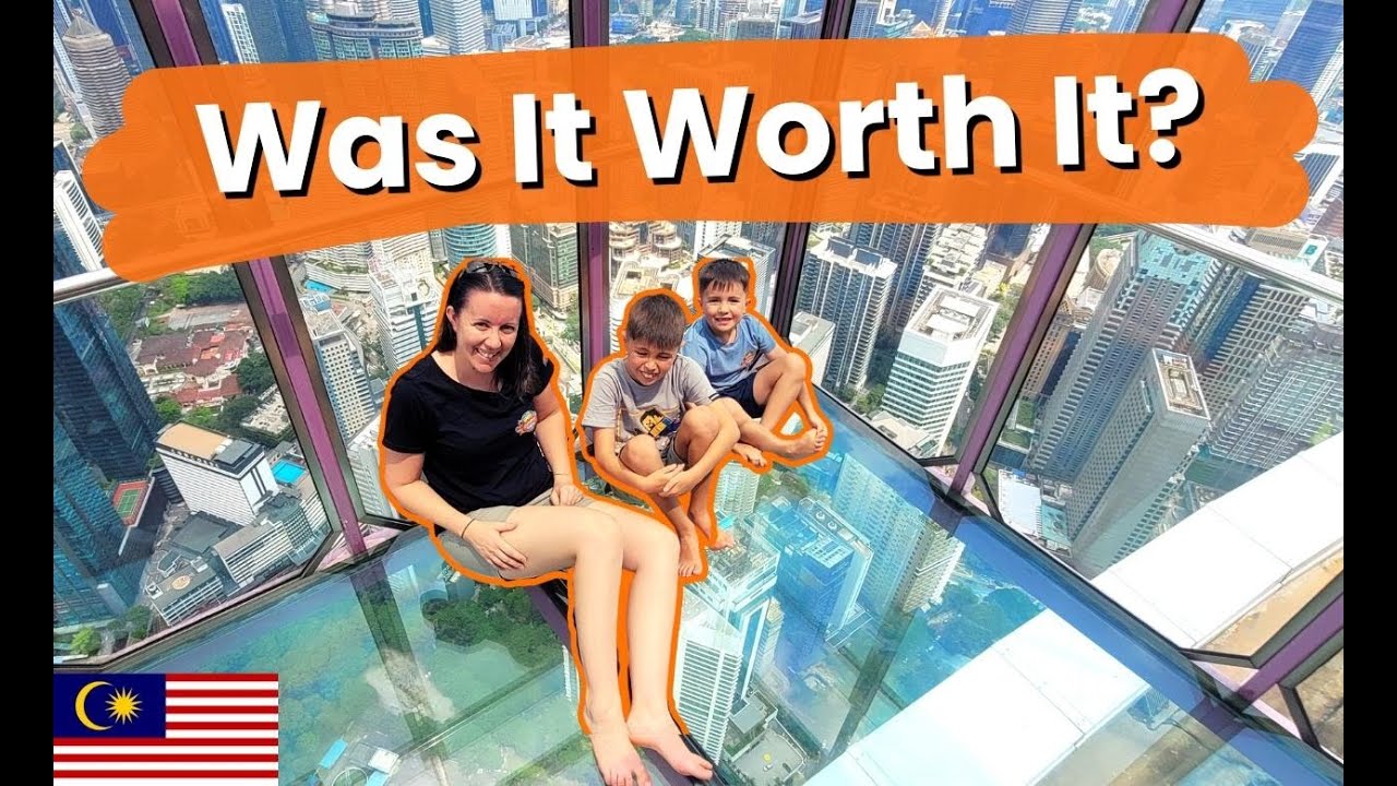 Experience the thrill as a family explores the majestic KL Tower in this captivating video.