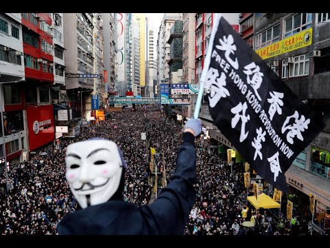 Police raids ahead of rally to mark 6-month anniversary of Hong Kong protest movement