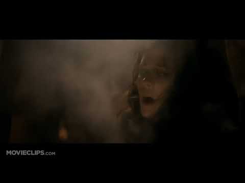 Trailer collage: the ice block, helicopter rotor blur, and steel corridors synced to uneasy score pulses