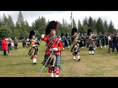 Chieftain leads the Pipe Bands at the close of 2019 Tomintoul Highland Games in Moray, Scotland Video