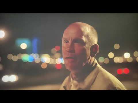 John Malkovich gets hit in the head with a can