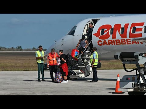 Cubanos atrapados en Haití vuelven a Cuba tras "susto y agonía" | AFP