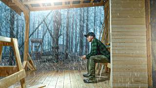 Building a high cabin in a thunderstorm and rain, Handcrafted windows and cornices