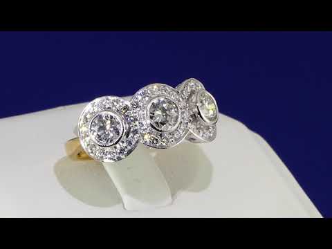 THREE STONE ROUND BRILLANT CUT HALO RING
