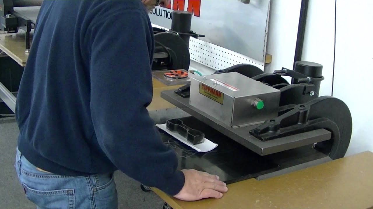 Tippmann Clicker Die cutting press cutting polypropylene using a steel rule cutting die