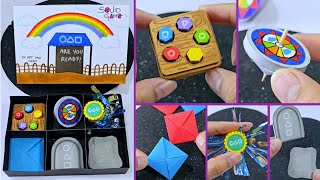 DIY ALL GAMES OF SQUIDGAME | Best paper toys | How to make paper ddakji , flying stone , Gongi ,Jegi