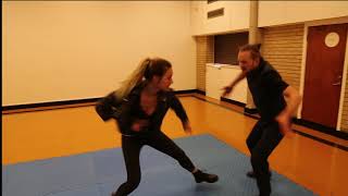 Ieva Andrejevaite fighting with the knife and gun video