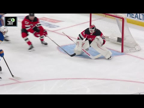 Tage Thompson scores a goal against the New Jersey Devils