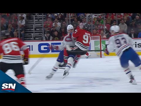 Canadiens' Kaiden Guhle lays massive ice on Blackhawks' Frank Nazar, leading to fights
