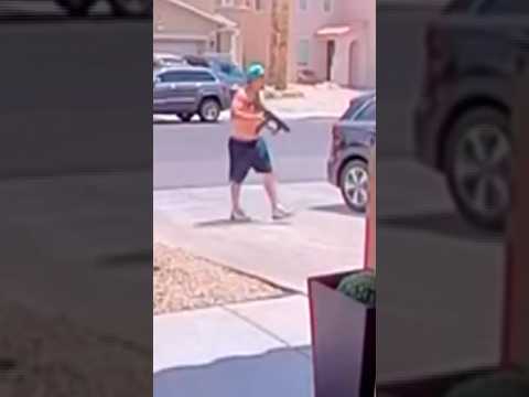 Videos show man firing AR-15 at Las Vegas homes