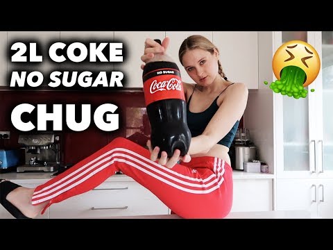 Pro Eater Chugs A 2 Liter Bottle Of Coke As If She Does This Every Day