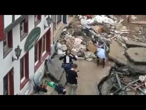 German reporter Susanna Ohlen helped to clean in the flooded region before her news report