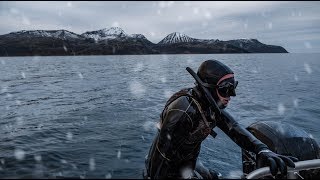How to stay warm when Spearfishing or Freediving in cold, frozen water.