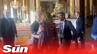 PM Rishi Sunak and Stella McCartney in 'awkward welcome' with King Charles