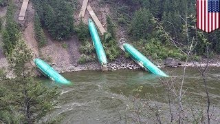 Plane fuselages tumble into Montana river after train derailment