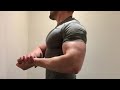 Has this cocky bodybuilder gained muscle? Big pecs and sleeve-stretching biceps