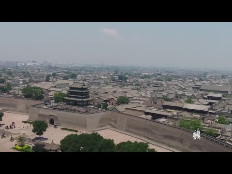 Dê um passeio no ar pela Cidade Antiga de Pingyao, um patrimônio mundial com uma longa história, na província de Shanxi