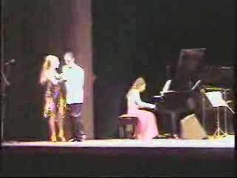  Roxana Belmonte  and  Fabian Belmonte  are  dancing  to  the  tango  "  Nochero Soy  "