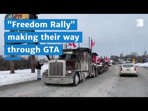 Truckers with the “Freedom Rally” make their way through the GTA’s main roadways