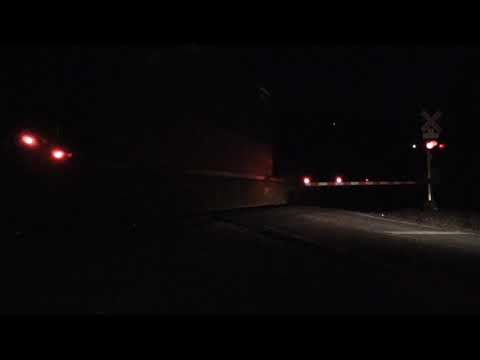 Union Pacific intermodal train flies through the night