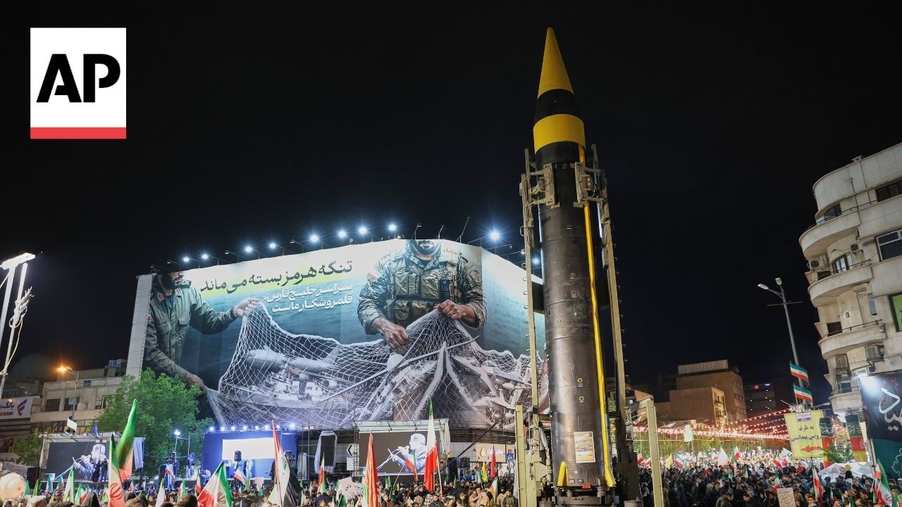 Iran displays what looks like a ballistic missile launcher at rallies