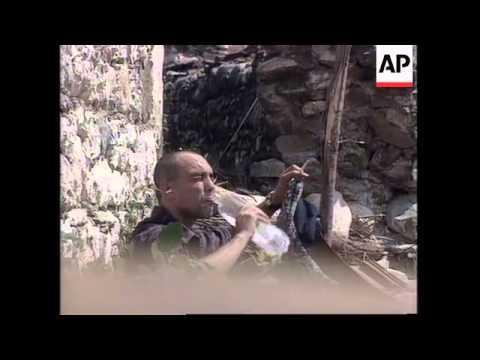 KOSOVO: KLA FIGHTERS CLASH WITH SERB PARAMILITARY POLICE