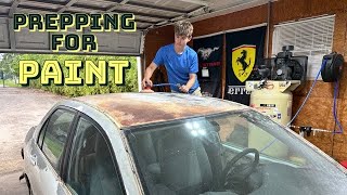 Sanding the Rusty Mitsubishi Lancer for Paint