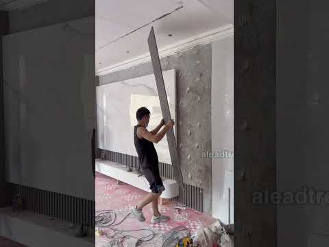 Sintered stone TV background wall installation #interiordesign #walldesign