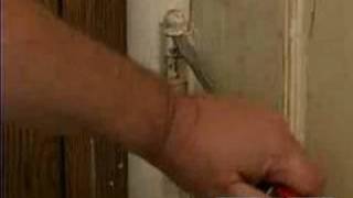 How to Update an Old Door : How to Remove Hinges from an Old Door