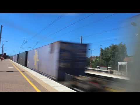 Freightliner Class 90s passing Wigan North Western