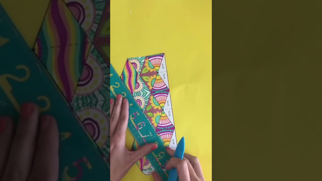 Patterns are here: https://www.agirlandagluegun.com/how-to-make-a-flextangle/