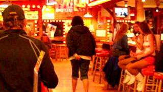 Lady Picks her booty at Hooters.AVI