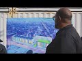 Pastor Corey Brooks leaving rooftop after raising money for community center