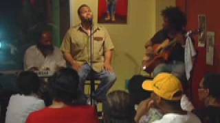 Brandon A. Thomas performing with Eric Roberson