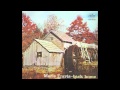 Merle Travis - Possum Up A Simmon Tree 