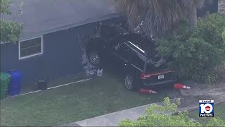 Woman hurt after SUV crashes into Broward County home