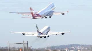preview picture of video 'Brisbane Airport: Emirates A380-800 vs. Qantas 747-400ER'
