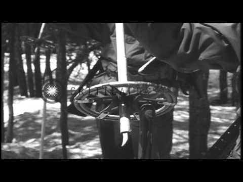The patrol fastening the skis and carrying them on their shoulders in the United ...HD Stock Footage