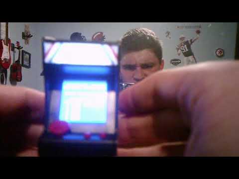 Demonstrating Pole Position Mini Arcade Cabinet