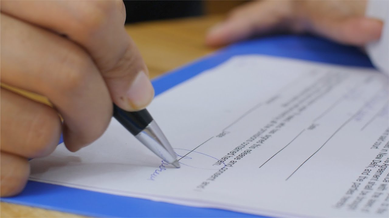 Closeup shot of a business woman / man signing a contract / le... | Indian Stock Footage | Knot9
