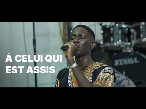 A CELUI QUI EST ASSIS