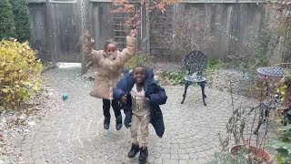 Delighted refugee children play in snow for first time