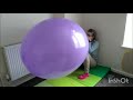 British Girl Blows To Pop A Giant Purple Balloon