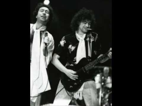 WILLIE AND THE POOR BOYS featuring JIMMY PAGE & PAUL RODGERS - Slippin and Slidin (1985)
